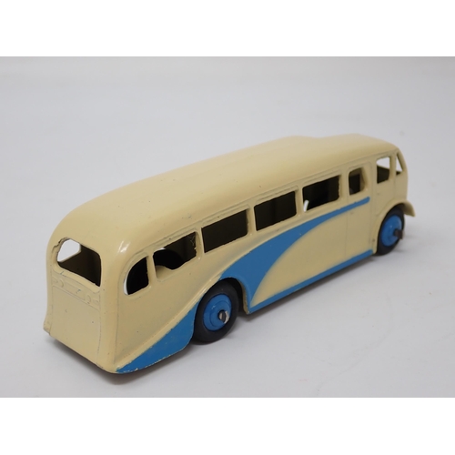 1017 - A Dinky Toys No.29e Single Deck Bus, cream and blue with blue hubs, mint condition. Ideal for layout