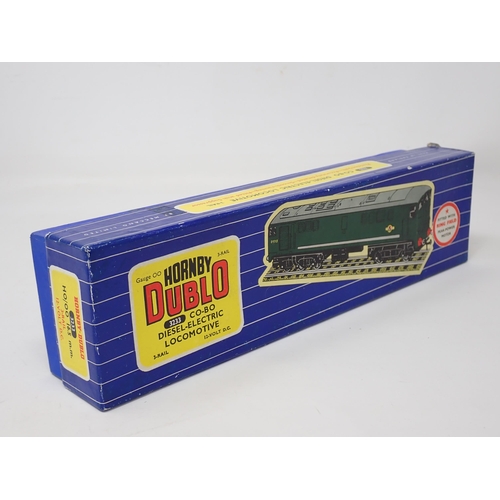 1021 - A Hornby Dublo 3233 3-rail Co-Bo Diesel-Electric Locomotive, unused and strung, boxed. Model has the... 