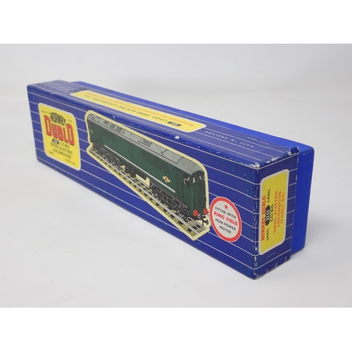 1021 - A Hornby Dublo 3233 3-rail Co-Bo Diesel-Electric Locomotive, unused and strung, boxed. Model has the... 