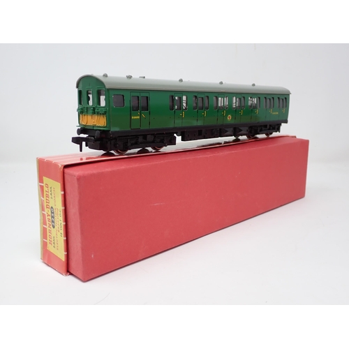 1022 - A Hornby Dublo 2250 EMU and 4081 Suburban Coach, all in Tony Cooper boxes. Models are in mint or ver... 