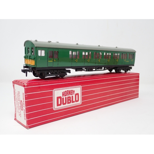 1022 - A Hornby Dublo 2250 EMU and 4081 Suburban Coach, all in Tony Cooper boxes. Models are in mint or ver... 