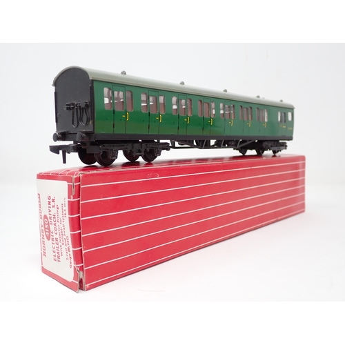 1022 - A Hornby Dublo 2250 EMU and 4081 Suburban Coach, all in Tony Cooper boxes. Models are in mint or ver... 