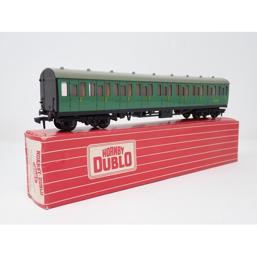 1022 - A Hornby Dublo 2250 EMU and 4081 Suburban Coach, all in Tony Cooper boxes. Models are in mint or ver... 