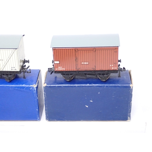 1052 - Eight Hornby Dublo D1 BR Wagons including 3x Goods Vans, 4x Meat Vans and a Fish Van, all mint or ve... 