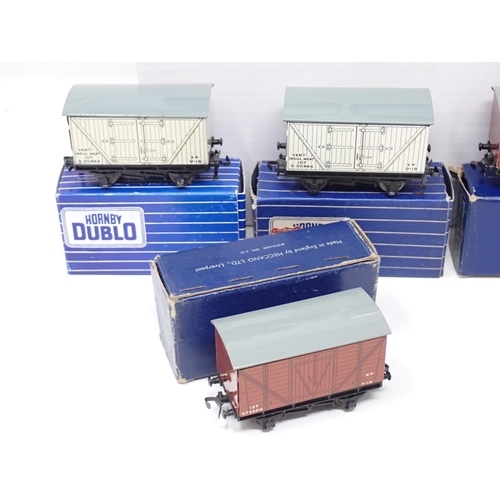 1052 - Eight Hornby Dublo D1 BR Wagons including 3x Goods Vans, 4x Meat Vans and a Fish Van, all mint or ve... 