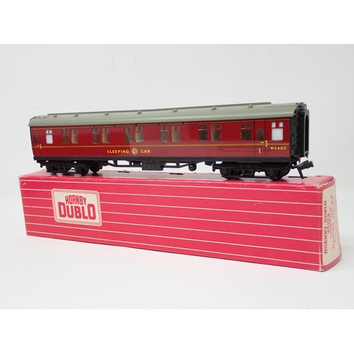 1055 - Seven boxed Hornby Dublo 2-rail Coaches comprising 4035, 4036, 2x 4037, all unused. Plus 4081 in exc... 