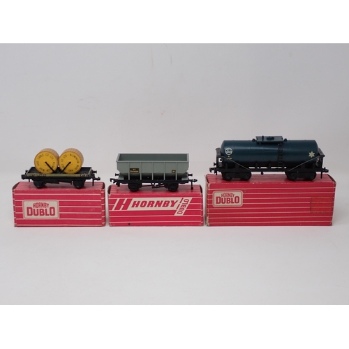 1058 - Three Hornby Dublo Wagons comprising 4685 Caustic Liquor Wagon, 4644 21 ton Hopper Wagon and 4646 Lo... 