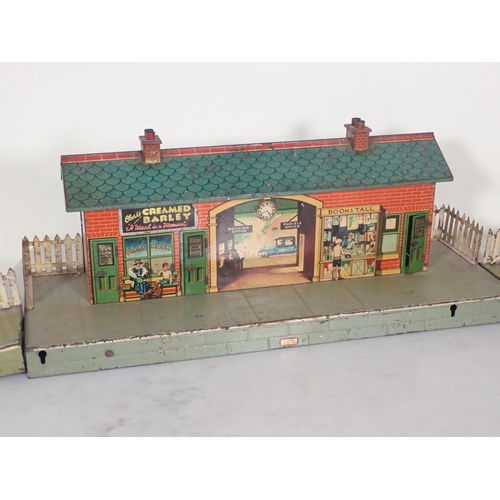 1080 - A boxed Hornby 0 gauge Signal Box, Signal, unboxed Turntable, Signals, Water Tower, Station Staff an... 