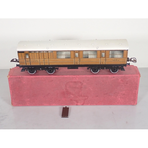 1089 - A boxed Hornby 0 gauge No.2 L.N.E.R. teak Corridor Coach and another in reproduction box