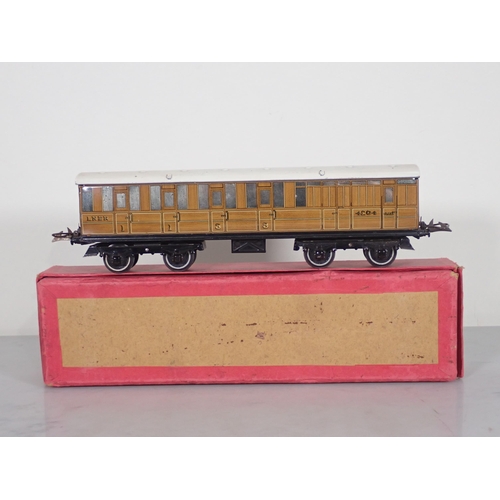 1089 - A boxed Hornby 0 gauge No.2 L.N.E.R. teak Corridor Coach and another in reproduction box