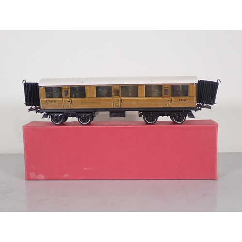 1089 - A boxed Hornby 0 gauge No.2 L.N.E.R. teak Corridor Coach and another in reproduction box