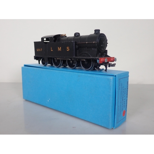 1100 - A Hornby Dublo EDL7 pre-war 0-6-2T Locomotive in LMS matt black livery No.6917, in reproduction box