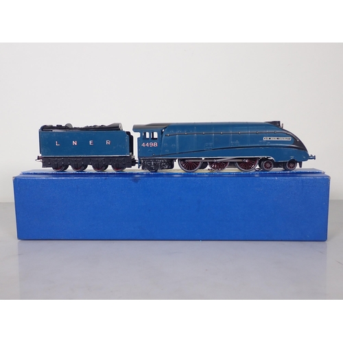 1105 - A Hornby Dublo EDL1 A4 Locomotive 'Sir Nigel Gresley' in LNER blue livery within reproduction pictur... 