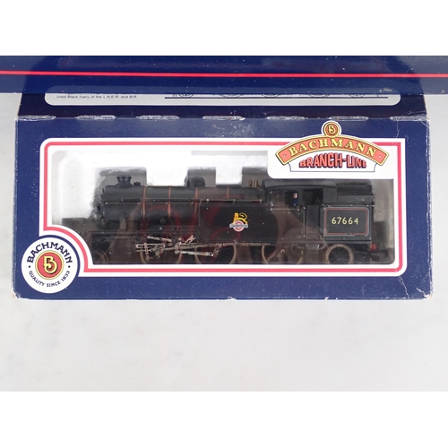 1121 - A boxed Bachmann 00 gauge WD 8F 2-8-0 Locomotive in B.R. austerity livery, a boxed Bachmann Class 42... 