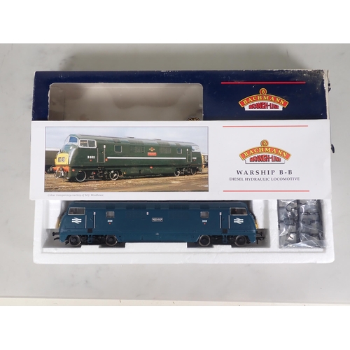 1121 - A boxed Bachmann 00 gauge WD 8F 2-8-0 Locomotive in B.R. austerity livery, a boxed Bachmann Class 42... 