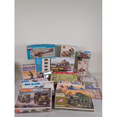 1160 - A box of plastic Military Vehicle, Aircraft and Railway Wagon Kits and Figures including Airfix, Mat... 