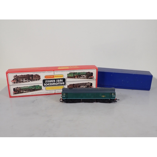 1162 - A boxed Hornby 00 gauge R.859 Black Five Locomotive 'Ayrshire Yeomanry', an unboxed Hornby 9F 'Eveni... 