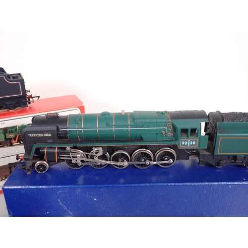 1162 - A boxed Hornby 00 gauge R.859 Black Five Locomotive 'Ayrshire Yeomanry', an unboxed Hornby 9F 'Eveni... 