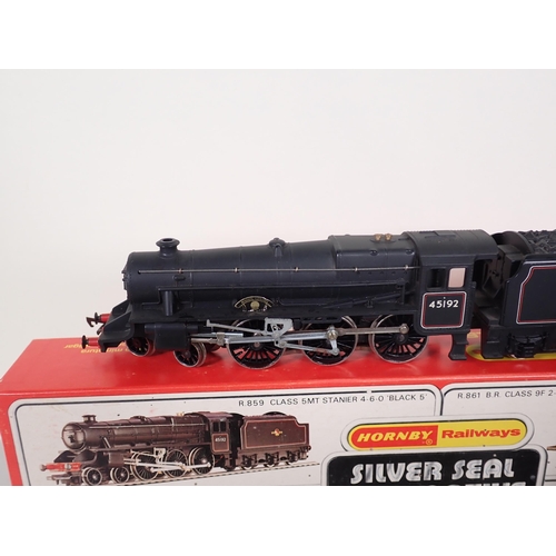 1162 - A boxed Hornby 00 gauge R.859 Black Five Locomotive 'Ayrshire Yeomanry', an unboxed Hornby 9F 'Eveni... 