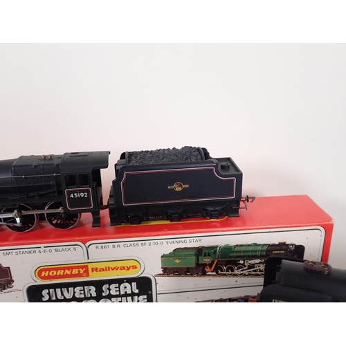 1162 - A boxed Hornby 00 gauge R.859 Black Five Locomotive 'Ayrshire Yeomanry', an unboxed Hornby 9F 'Eveni... 