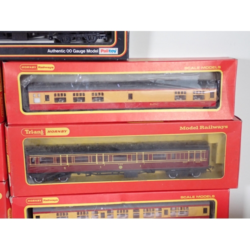 1165 - A boxed Triang Hornby 0-6-0T Locomotive, seven boxed Hornby and Hornby Triang 00 gauge Coaches, a Ma... 