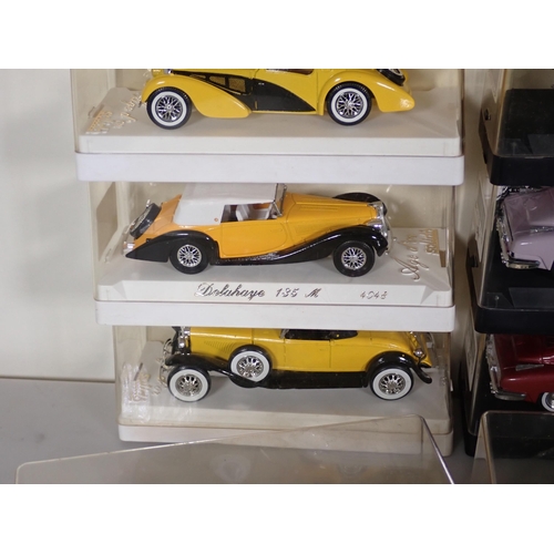 1178 - Twenty nine perspex box Solido Age D'or diecast Models and an Olympics Model Van