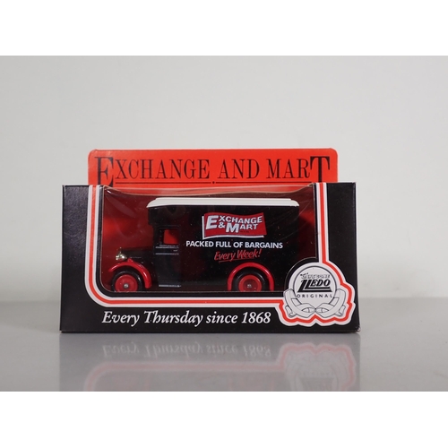 1181 - A box of Lledo and other boxed diecast advertising Models including H. Samuel, Tetleys, Fuji Film, e... 