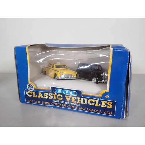 1187 - A boxed ERTL 1/32 scale AA Land Rover, a boxed ERTL Classic Vehicles Set 'Taxis of the World' and fo... 