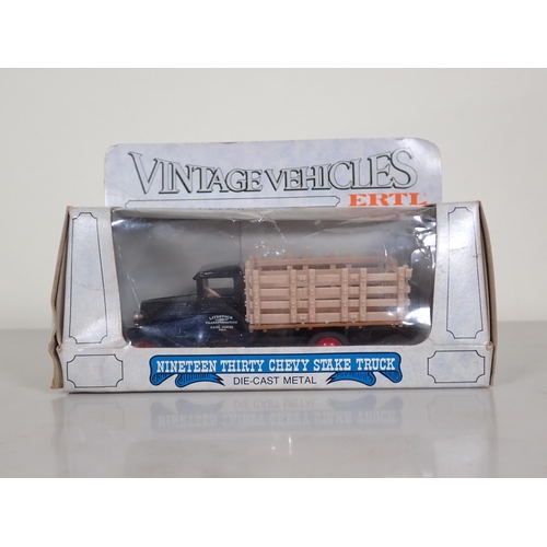 1187 - A boxed ERTL 1/32 scale AA Land Rover, a boxed ERTL Classic Vehicles Set 'Taxis of the World' and fo... 