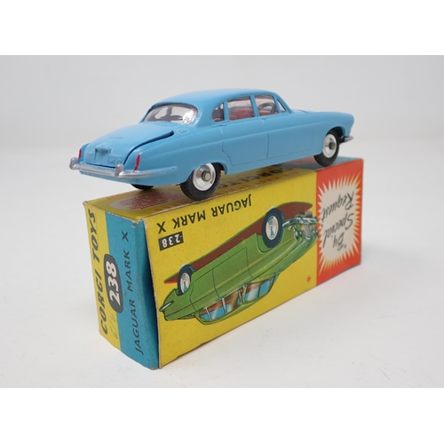 1214 - A boxed Corgi Toys No.238 pale blue Jaguar Mk10