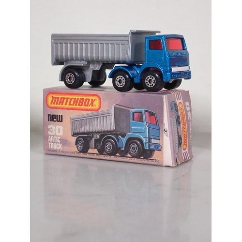 1225 - Four boxed Matchbox Superfast and 75 diecast Models including No.11 Car Transporter, No.30 Artic Tru... 