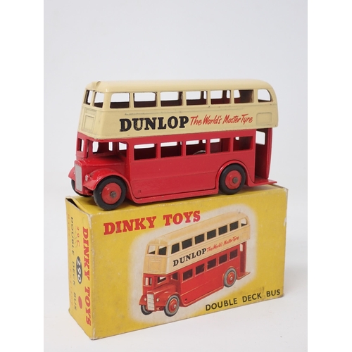 1232 - A boxed Dinky Toys No.290 red and cream Double Deck Bus Dunlop