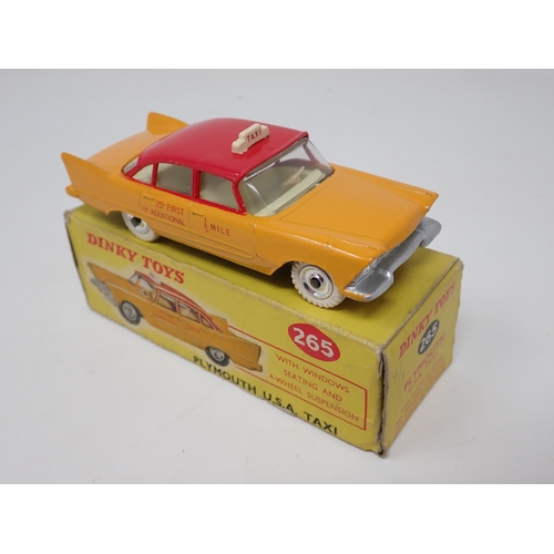 1233 - A boxed Dinky Toys No.265 Plymouth USA Taxi