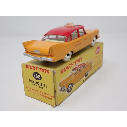 1233 - A boxed Dinky Toys No.265 Plymouth USA Taxi