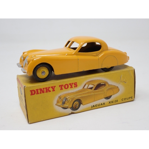 1256 - A boxed Dinky Toys No.157 yellow Jaguar XK120