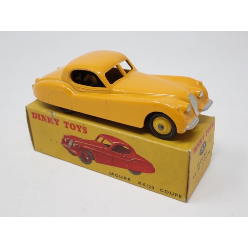 1256 - A boxed Dinky Toys No.157 yellow Jaguar XK120