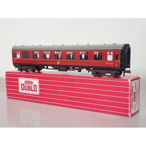 1275 - Seven boxed Hornby Dublo Coaches comprising 4075 Passenger Brake Van, 2x 4062 Open Corridor Coaches ... 