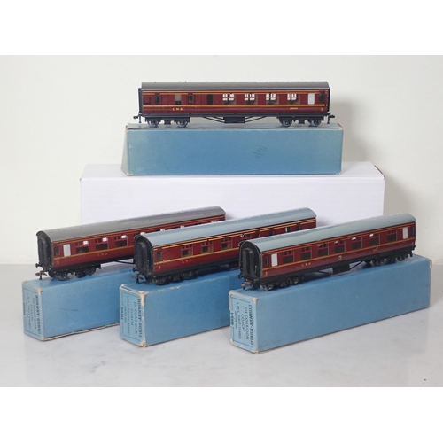 1278 - Four boxed Hornby Dublo D3 LMS Corridor Coaches comprising two 1st/3rd and two Brake/3rds, coaches V... 