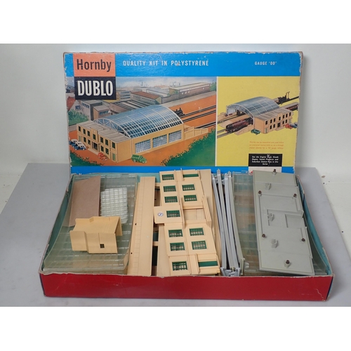 1303 - A boxed Hornby Dublo 5083 Terminal or Through Station Composite Kit with spare perspex roofs