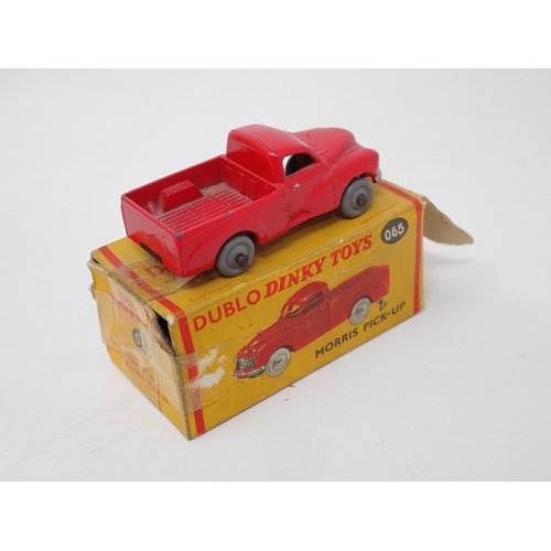 1306 - A boxed Dublo Dinky Toys 070 A.E.C. Mercury Tanker, boxed 065 Morris Pick-up (box damaged and taped)... 