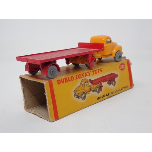 1306 - A boxed Dublo Dinky Toys 070 A.E.C. Mercury Tanker, boxed 065 Morris Pick-up (box damaged and taped)... 