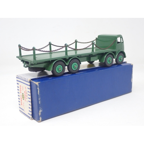 1310 - A boxed Dinky Toys No.905 green Foden Flat Truck with chains