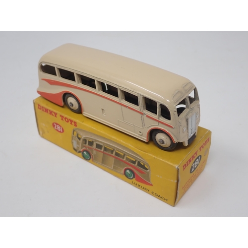 1312 - A boxed Dinky Toys No.281 Luxury Coach in cream with red flash and hubs