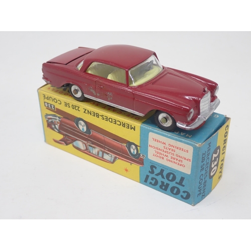 1318 - A boxed Corgi Toys No.230 maroon Mercedes-Benz 220SE Coupe