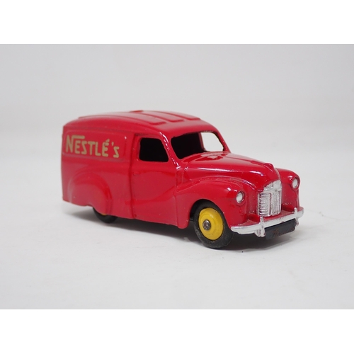 1324 - A boxed Dinky Toys No.471 Austin 'Nestle' Van