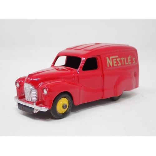 1324 - A boxed Dinky Toys No.471 Austin 'Nestle' Van