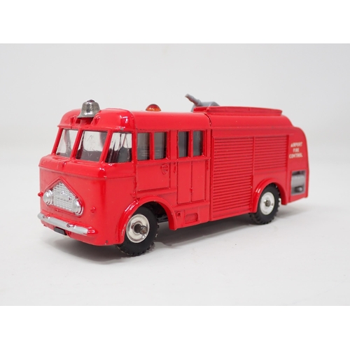 1326 - A boxed Dinky Toys No.276 Airport Fire Tender with instructions, packing ring and test tag