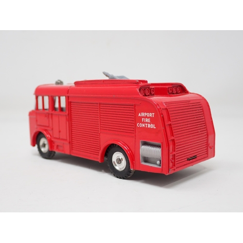 1326 - A boxed Dinky Toys No.276 Airport Fire Tender with instructions, packing ring and test tag