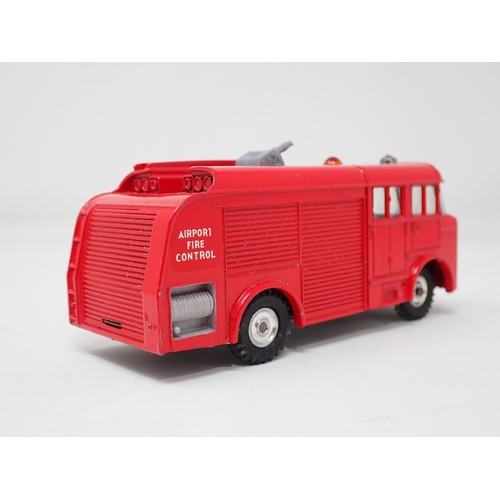 1326 - A boxed Dinky Toys No.276 Airport Fire Tender with instructions, packing ring and test tag