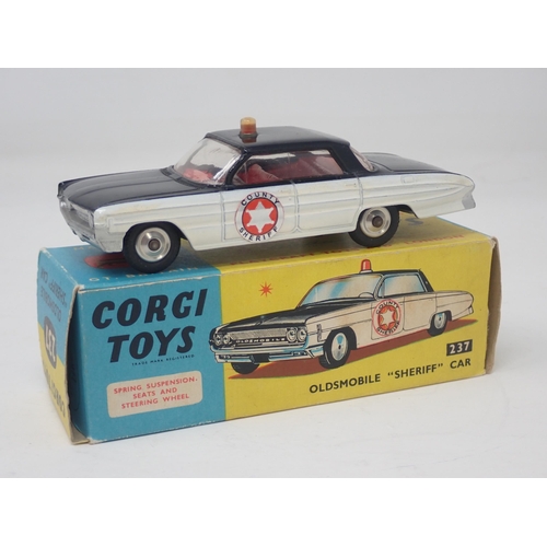 1330 - A boxed Corgi Toys No.237 Oldsmobile Sheriff Car